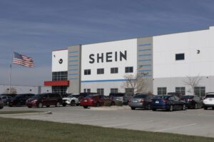 Shein has scrapped plans for a UK warehouse as its £50bn London IPO faces uncertainty amid regulatory crackdowns, supply chain concerns, and ESG scrutiny.