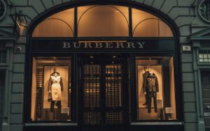 Burberry plans to cut nearly 18% of its global workforce, with 1,700 jobs at risk, as part of a £100m cost-saving drive following a £66m loss and falling sales in China.